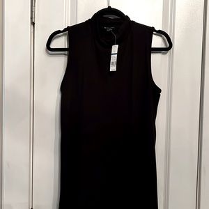 Mock turtle neck sleeveless black tee.never worn with tags
